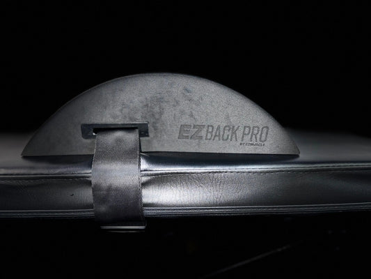 EZBack Pro Level 3 strap positioned on a flat workout bench, providing advanced posture support for experienced users during strength training