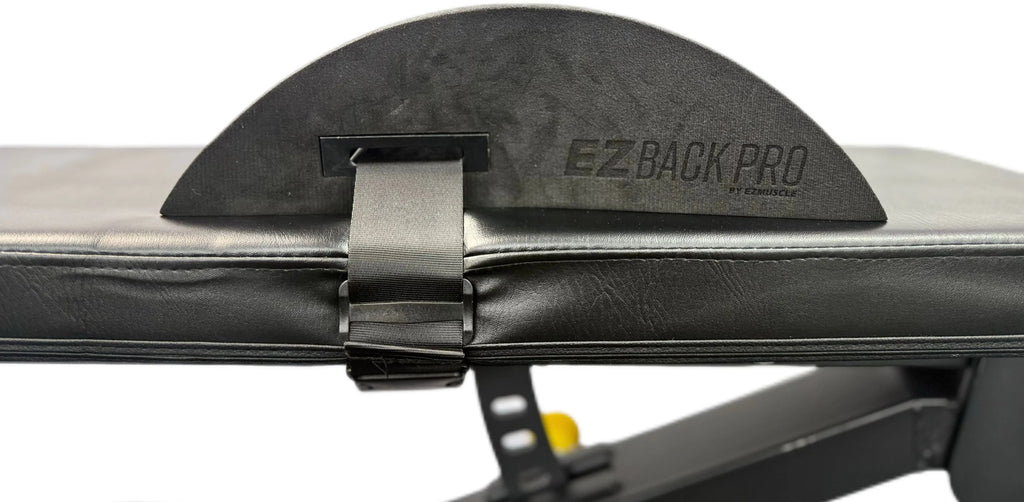 EZBack Pro Level 3 strap placed on a flat workout bench, designed for advanced back support and precise spinal alignment during high-intensity training.
