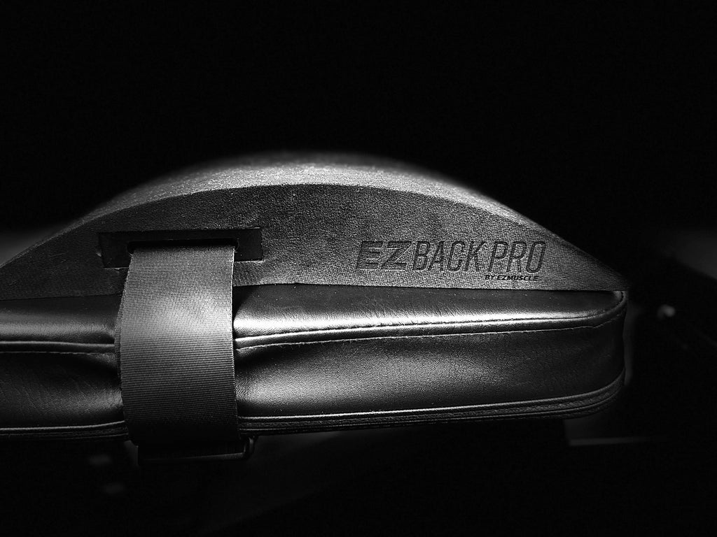 EZBack Pro Level 1 strap attached to a workout bench to support spinal alignment and improve posture during training.